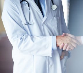 doctor handshake with a patient